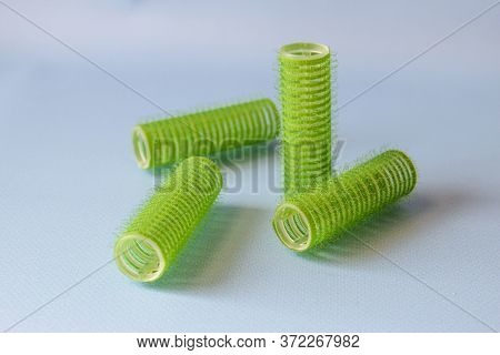 Hair Culers On The Blue Backround. Green Culers For Hairdress.