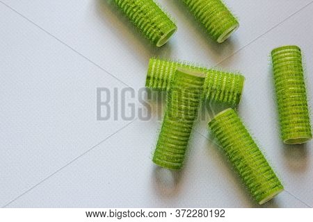 Hair Culers On The Blue Backround. Green Culers For Hairdress.