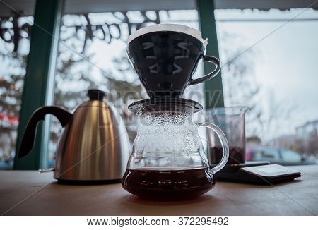 Filtered Coffee,fresh V60 On Table,soft Focus In Cafe