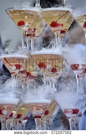 Pyramid Of Glasses With A Champagne Close Up.