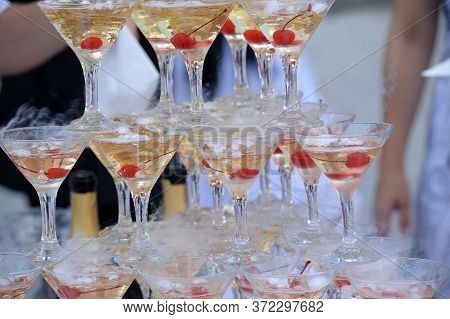 Pyramid From Glasses Of Champagne On Wedding Party