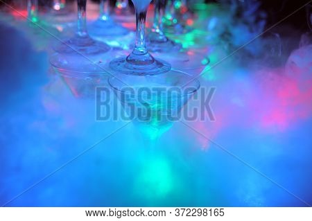 Glasses Of Champagne And Lights