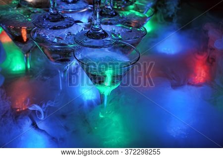 Pyramid Of Glasses With Light.