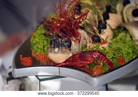 Stuffed Pike With Vegetables And Herbs. Hearty Dish In One Of The Bars.