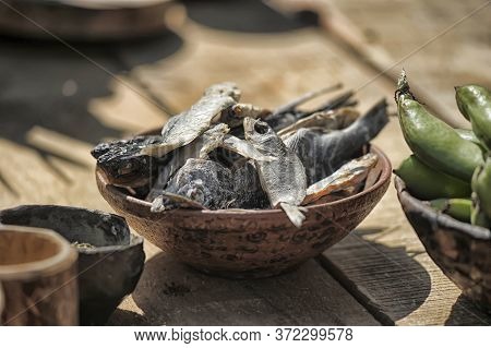 Cured Fish In A Ceramic Bowl On A Table