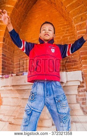 Bagan, Myanmar - December 9, 2016: Local Boy At The Temple No 860 In Bagan, Myanmar
