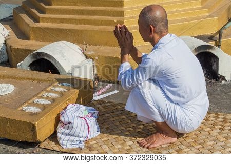Hpa An, Myanmar - December 13, 2016: Buddhist Man Praying At Mt Zwegabin Near Hpa An, Myanmar