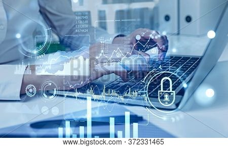 Hands Of Woman Engineer Typing On Laptop In Blurry Office With Double Exposure Of Immersive Hud Info