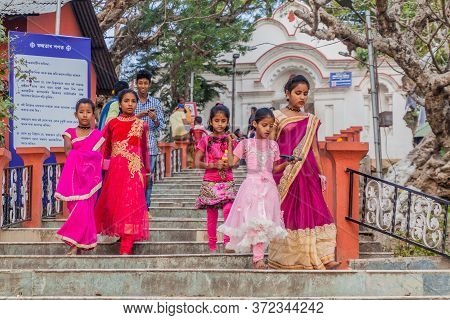 Guwahati, India - January 31, 2017: Colorfuly Dressed Girls Visit The Temple Complex At Peacock Uman