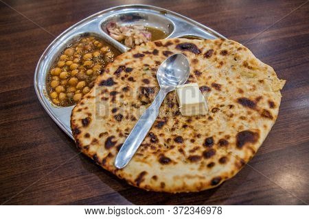 Amritsari Kulcha Clay-baked Stuffed Naan , Typical Meal Of Amritsar, India