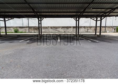 Car Park Empty Open Garage Roof.outdoor Of Parking Garage With Car And Vacant Parking Lot In Parking