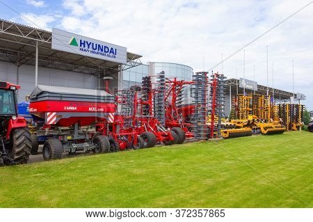 Kyiv, Ukraine - June 16, 2020: Tractor And Unia Cultivator On The Land For Minimum-tillage Technolog
