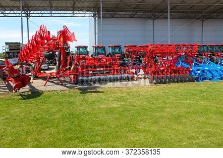 Kyiv, Ukraine - June 16, 2020: Tractor And Unia Cultivator On The Land For Minimum-tillage Technolog