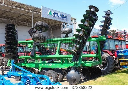 Kyiv, Ukraine - June 16, 2020: Large Disc Plough Martlet, Towing For Tractors To Plow Fields, Agains