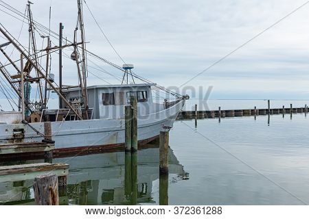 Boatyard, With Fishing Boats In The Gulf Of Mexico At Fulton, Texas, Usa