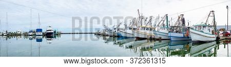 Boatyard, With Fishing Boats In The Gulf Of Mexico At Fulton, Texas, Usa