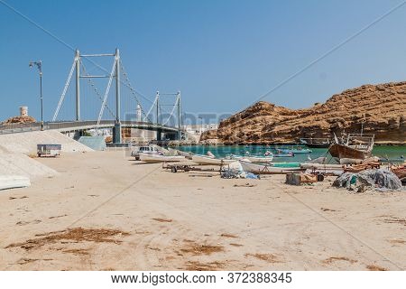 Fishing Boats In Sur, Oman. Khor Al Batar Bridge In The Background.