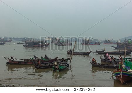 Myeik, Myanmar-February 8,2020. Busy Burmese seaport south of the country on the coast of the Andaman Sea.It is a gateway to the 800 offshore islands of the Mergui Archipelago.Foggy day in the city