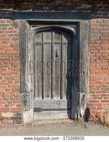 Old Wooden Door Of An Old House In A Small Village In Kent,uk