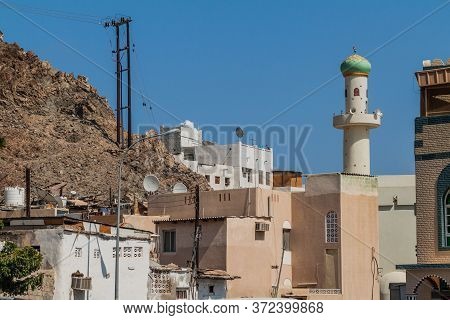 Houses And A Minaret In Muttrah Neighborhood In Muscat, Oman