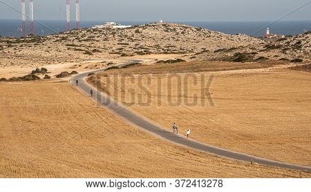 Cape Greko, Cyprus, June 08 2020: Tourist People Trekking On A Road At Cape Greko Peninsula Paralimn
