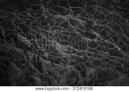 Dark Stone Wall Texture With Shadows And Cracs