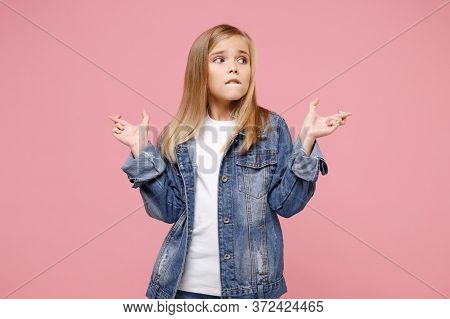 Little Kid Girl 12-13 Years Old In Denim Jacket Isolated On Pink Background. Childhood Lifestyle Con
