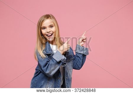 Funny Little Kid Girl 12-13 Years Old In Denim Jacket Isolated On Pastel Pink Background Children St