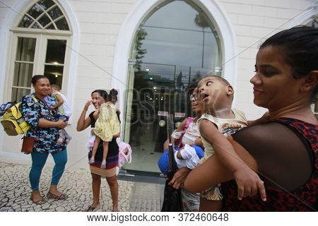 Salvador, Bahia / Brazil - April 17, 2018: Children With Microcephaly Are Seen Seeking Justice At Th