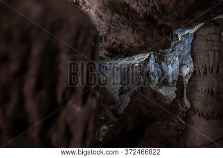 Inside The Mysterious Flowstone Cave 'nebelhöhle' With Stalagmites And Stalactites In Germany.