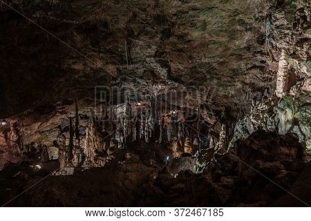 Inside The Mysterious Flowstone Cave 'nebelhöhle' With Stalagmites And Stalactites In Germany.