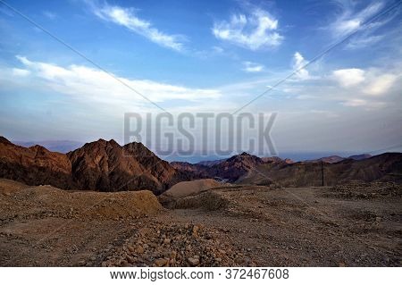 Beautiful Nature Of Israel - Mountain Range Against A Blue Cloudy Sky