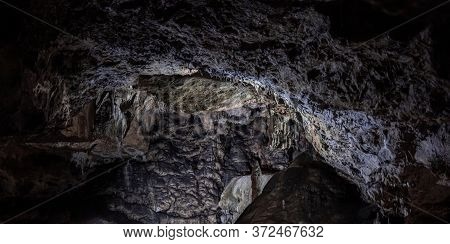 Inside The Mysterious Flowstone Cave 'nebelhöhle' With Stalagmites And Stalactites In Germany.