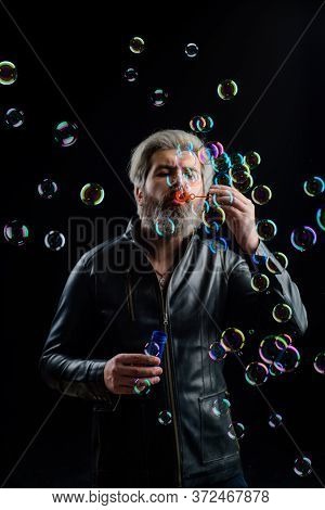 Soap Bubbles. Bearded Man Blowing Bubbles. Play With Bubbles. Bearded Man Blowing Soap Bubbles. Happ