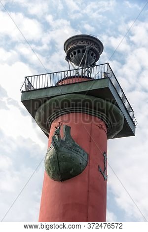 Russia, St. Petersburg, 12,04,2015 Rostral Column On The Spit Of Vasilyevsky Island In St. Petersbur