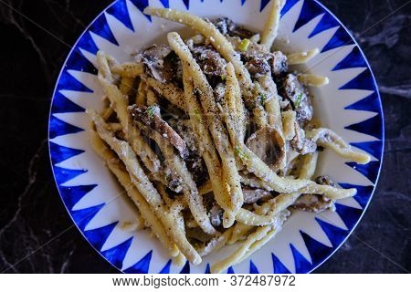 Homemade Trofie Pasta With Delicious Mushrooms And Ricotta