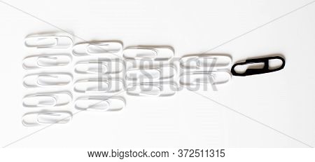 Leadership Concept With Black Clic Leading Among White
