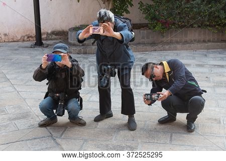 Yunnan, China February 2019. Inhabitants Of A Rural Village Amazed By The Presence Of Western Touris