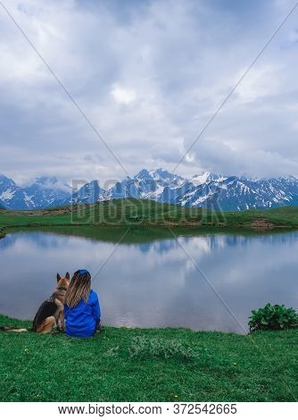 Mountain Lakes Of Koruldi. Caucasian Mountains. The Peaks Of The Snowy Mountains Are Reflected In Th