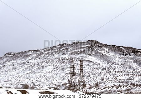 View Of A Snow-covered Dump In The Town Of Karabash