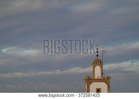 A Mosk Tower In A Blue Sky