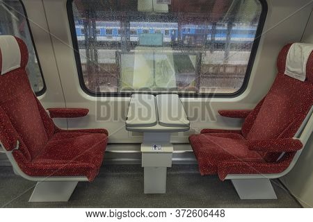 Electric Multiple Unit Interior With Red Seat In First Class Coach