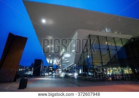 Amsterdam, Netherlands - March 7, 2020: Empty Streets Near Stedelijk Museum Illuminated At Night In 