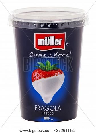 Bucharest, Romania - February 25, 2015. Muller Yogurt Cream With Strawberries, Produced By Molkerei 