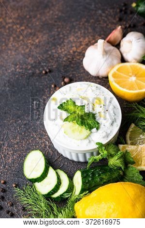 Traditional Greek Sauce Or Appetizer Tzatziki With Yogurt, Garlic, Cucumber And Dil