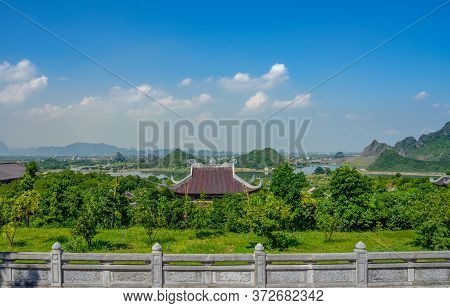 Angle View From The Complex Of Bai Dinh Pagoda Buddhist Temples With Blue Sky And Clouds On Bai Dinh