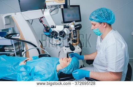 Eye Surgery. A Patient And Surgeon In The Operating Room