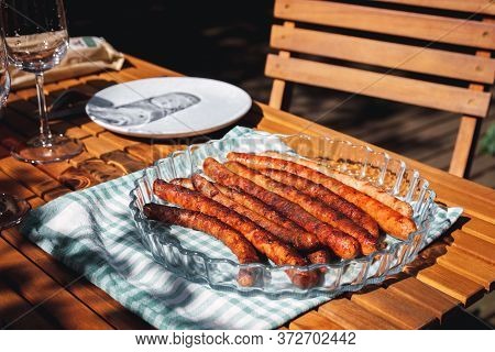 Pork Chipolata. Close-up View Of Fried Sausages. Meat Dish