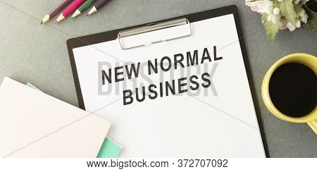 New Normal Business Text On White Letter Board Background. Adapting To New Life Post-lockdown Change