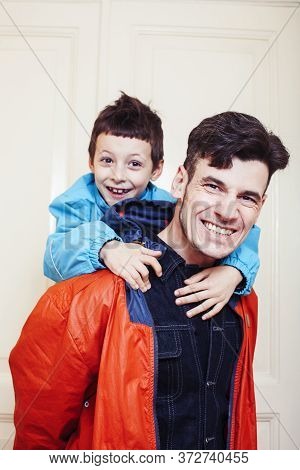 Faher And Son Together Having Fun At Home, Lifestyle Happy Family, People At Home